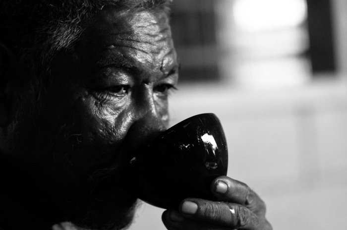 Old man drinking kava