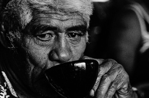 Old man drinking kava