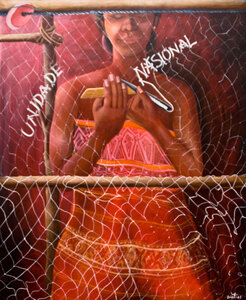  Liberation art from the offices of the East Timor Development Agency. This NGO sponsored the piece, created by an artist with no prior experience. This particular piece shows a woman mending her fishing nets with a potent message.
