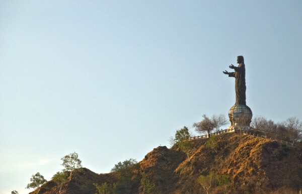 In the 1970s and 1980s, the Catholic Church became a place of refuge for the Timorese people. Approximately 70% of the population converted in that time. This monument, reminiscent of Christ of the Andes, overlooks Dili. It is a popular pilgrimage place for people throughout Timor-Leste.
