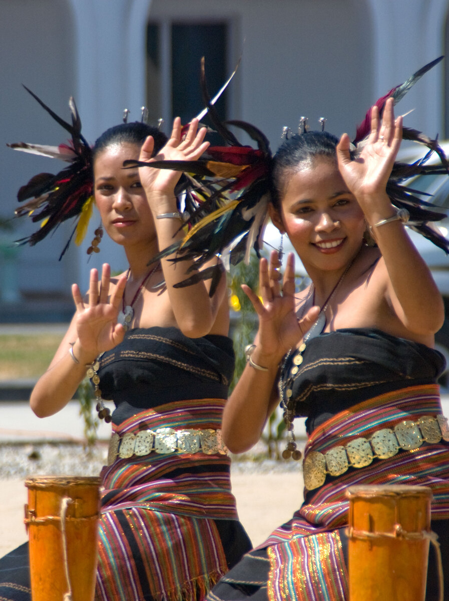 Two of the many dancers who performed at a celebration promoting tourism in Timor-Leste. This was one of a series of public events that the government used to gather people together peacefully. They were entirely successful.

