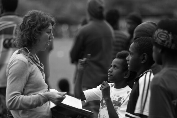 An anthropologist interviews young attendees at the Freswota Independence celebrations.
