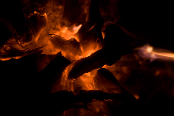 A small fire is a common sight at Tanna nakamals. Once the effects of the kava begin to set in, Tannese men will sit quietly and 'listen' to the drug while staring into the coals.
