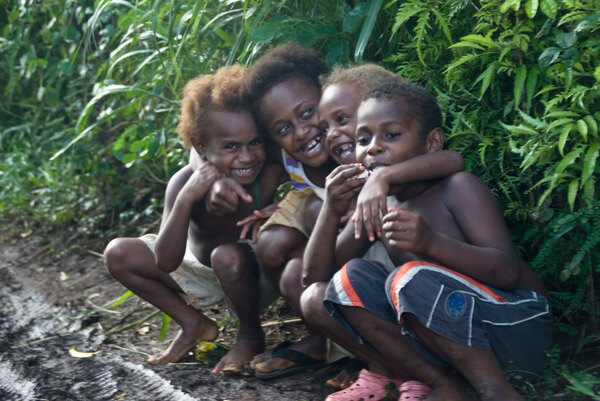 Some of the children from my family playing on the road. I say 'Jessica and friends' because she's such a ham, and she's learned to corral other children into the picture in order to entice me to take another of her. She'll go far in this life.
