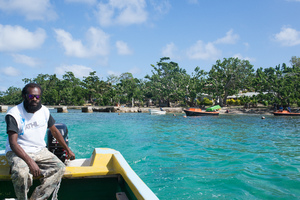 A water taxi leaves Ifira island.

