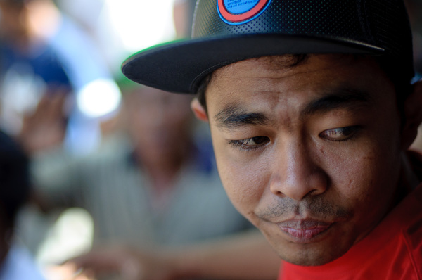 Scenes from a traditional cockfight in Mataram, Lombok, Indonesia.

