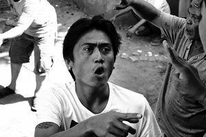 Scenes from a traditional cockfight in Mataram, Lombok, Indonesia.
