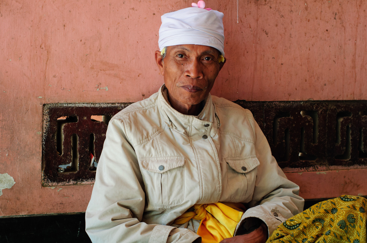 This man looks after a mountain-top temple in Lombok, Indonesia.
