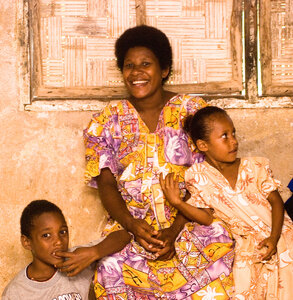 A mother with her children. I love the line and deeply
saturated colour of this shot.
