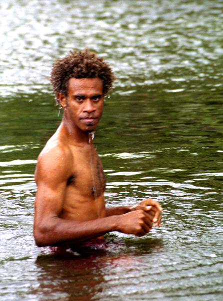 Jimmy, our project officer, came with Kibwana and me to Vanua Lava. 
He loudly voiced his fears about going to the Silver river,
where five crocodiles (Vanuatu's entire croc population) live.
Nonetheless, when we finally arrived on its banks, he didn't hesitate
to jump in.
