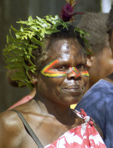 This woman walked with the entire population of her village into
Isangel dressed in 'kastom' fashion. They performed a thanksgiving
dance at the opening of the first full-time radio station ever
on their island. 

