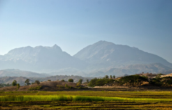 Mountains loom over the countryside near Baucau on the road to Los Palos.
