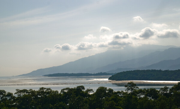 Mountains loom over the countryside near Baucau on the road to Dili.
