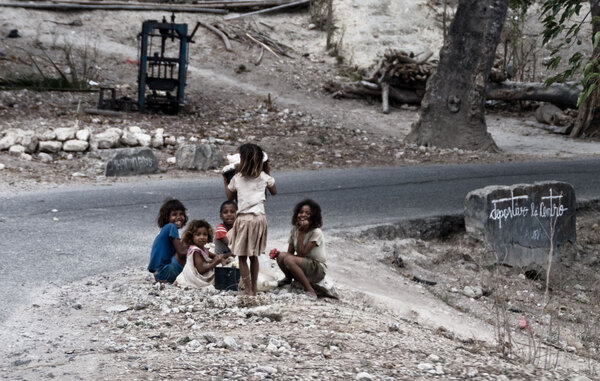 I can't count the number of children I saw hanging out on the roadside, watching the world go by them.
