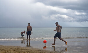 Even an imminent squall wasn't enough to quench their love of the beautiful game.
