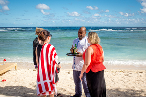 Breakas resort was one of hundreds of businesses that was badly damaged by cyclone Pam. But David's friendly manner with guests is still as warm as ever.
