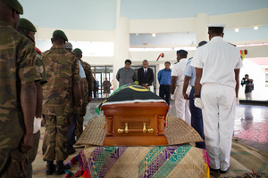 Edward Natapei's coffin is carried into parliament and laid out in the foyer.

