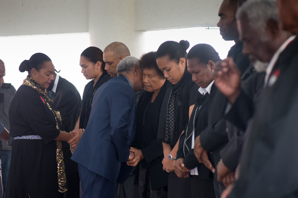 Prime Minister Sato Kilman pays his respects.
