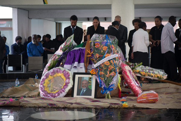 The coffin of Edward Natapei lies in state at Parliament.

