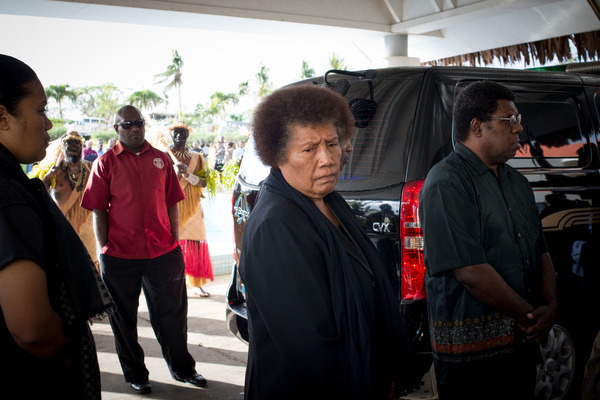 Mrs Natapei follows her husband's coffin into Parliament, where she and her family will accept condolences from the thousands of mourners who arrive to pay their respects.
