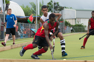 Shots from a couple of games in a junior field hockey tournament held in Port Vila.
