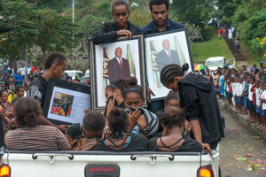 Following a funeral service in the Parliamentary rotunda, much beloved and universally admired President Baldwin Lonsdale was farewelled by a massive crowd lining the route to the airport. A kilometre-long cortege accompanied the body.
