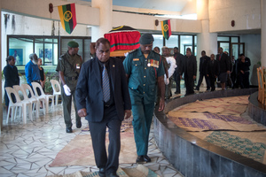 Following a funeral service in the Parliamentary rotunda, much beloved and universally admired President Baldwin Lonsdale was farewelled by a massive crowd lining the route to the airport. A kilometre-long cortege accompanied the body.
