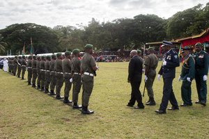 President Obed Tallis inspects the troops.
