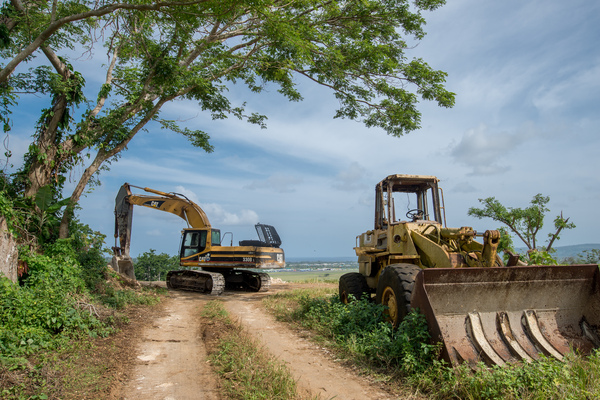 Construction equipment at the end of the road in Erangorango, overlooking the airport.

