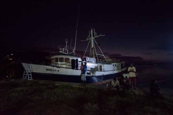 Shots from a night-time unloading.
