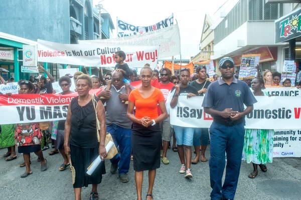 Florence Lengkon led a march through town and up to Parliament in which nearly a thousand people demonstrated their desire to see an end to violence against women.
