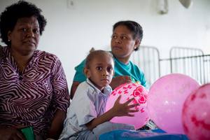 Miss Vanuatu Valerie Martinez visits the children's ward at Vila Central Hospital.
