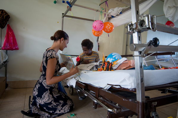 Miss Vanuatu Valerie Martinez visits the children's ward at Vila Central Hospital.
