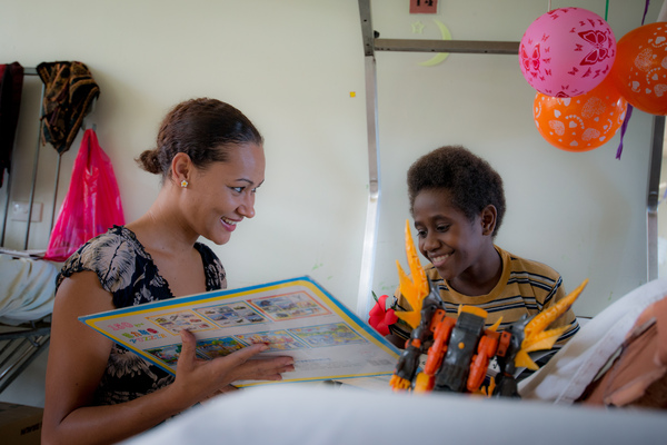 Miss Vanuatu Valerie Martinez visits the children's ward at Vila Central Hospital.
