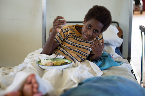 Miss Vanuatu Valerie Martinez visits the children's ward at Vila Central Hospital.
