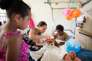 Miss Vanuatu Valerie Martinez visits the children's ward at Vila Central Hospital.
