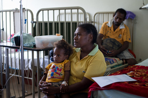 Miss Vanuatu Valerie Martinez visits the children's ward at Vila Central Hospital.

