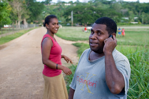 A few photos of people using mobile phones.
