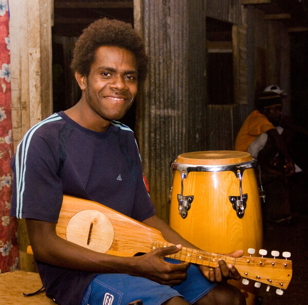 This young man plays with Tausake, one of the oldest and 
most reputed string bands in Vanuatu.
