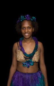 This young woman braved a rather chilly evening in order to dance at a Melanesian feast. When the guests cancelled at the last minute, she quickly donned a hoodie and headed home.
