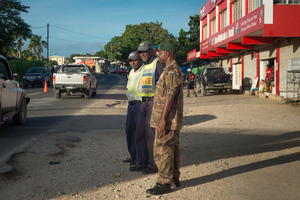 Paramilitaries, local and national police collaborated in manning checkpoints throughout Port Vila to keep a lid on 2015 New Year's festivities.
