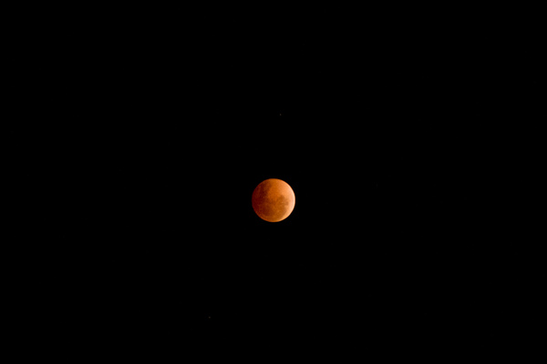 Lunar eclipse, just past the peak.
