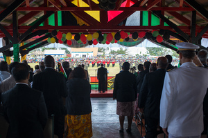 Prime Minister of Vanuatu Sato Kilman reviews the troops as rain falls on Vanuatu's 35 independence day celebrations.
