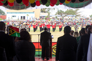 Vanuatu President Baldwin Lonsdale stands as the Vanuatu Mobile Force band plays the national anthem during celebrations marking 35 years of independence.
