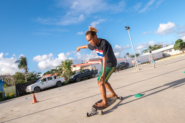 The Vanuatu National Surfing team does a little dry-land training. Boucherie Furet very kindly allowed its parking lot to be repurposed for a day as a dry-land training ground. The team members used specially crafted skateboards designed to mimic a surfboard's feel as the trainees run the slalom course. The team, aged between 10 and 35 years old, will compete in the Melanesian Cup next month in Noumea.
