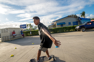 The Vanuatu National Surfing team does a little dry-land training. Boucherie Furet very kindly allowed its parking lot to be repurposed for a day as a dry-land training ground. The team members used specially crafted skateboards designed to mimic a surfboard's feel as the trainees run the slalom course. The team, aged between 10 and 35 years old, will compete in the Melanesian Cup next month in Noumea.
