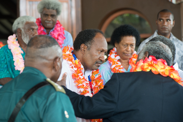 Newly elected Prime Minister Charlot Salwai chats with President Baldwin Lonsdale following a thanksgiving service at the cathedral.
