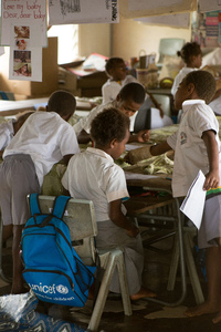 Students from Vila North school in Port Vila work using materials provided by UNICEF, whose extensive support has made it possible for Vila North to continue providing an education for hundreds of children.
