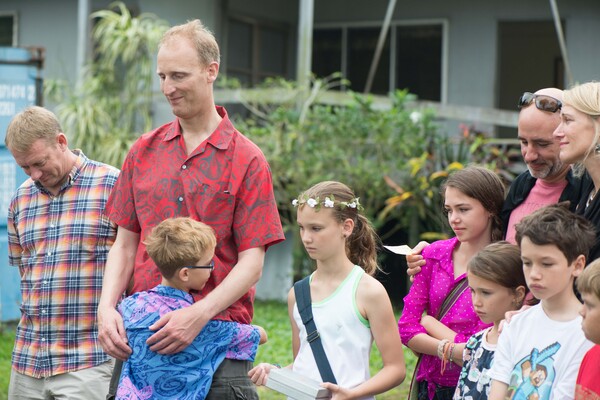 Shots from a memorial tree planting ceremony.
