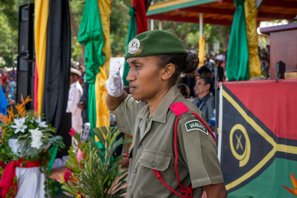 A member of the Vanuatu Mobile Force salutes passing comrades at the reviewing stand at Vanuatu's 35th independence anniversary celebrations.
